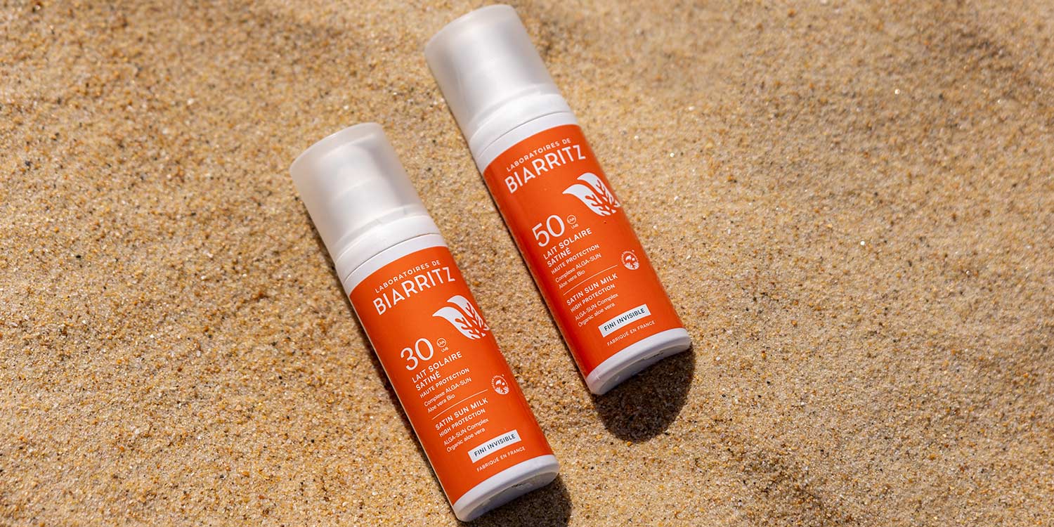 Lait solaire des Laboratoires de Biarritz sur le sable